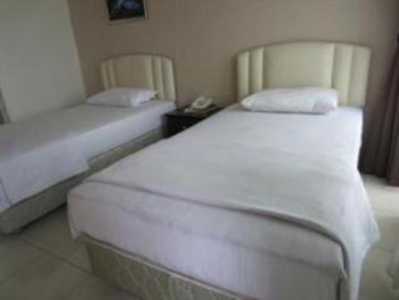 Mendu Inn Kuching Chambre photo